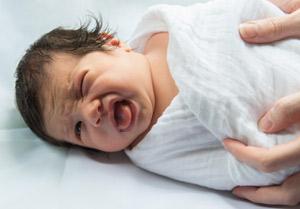 Baby making a face. / Divine Beauty Photography
